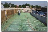 Inspectors examine rebar placed on the deck of the eastbound 12th Street Viaduct which is being rebuilt as part of the Route 139 project photo.