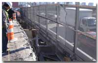 Construction work along the two-level wall separating the lower and upper roadways of the 14th Street Viaduct photo.