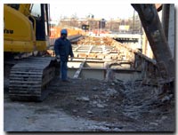 Crews on working on the demolition of the 12 Street Viaduct photo.