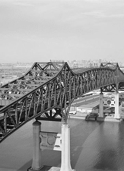 Looking northwest, the Pulaski Skyway rises over the Passaic River photo